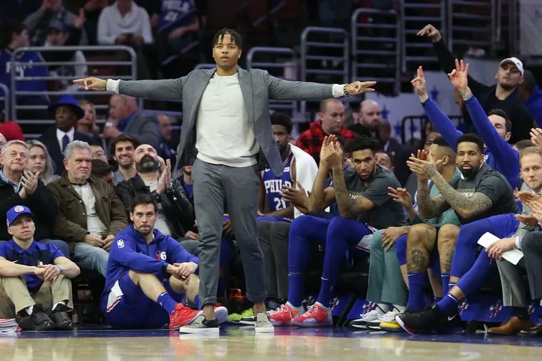 Sixers' Markelle Fultz, the Sixers' $15 million cheerleader, celebrates as his team plays the Rockets on January 21, 2019.