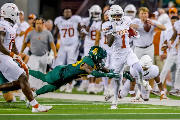 Texas' Xavier Worthy (1) returns a Baylor punt during the first half of an NCAA college football game Saturday, Sept. 23, 2023, in Waco, Texas. (AP Photo/Gareth Patterson)