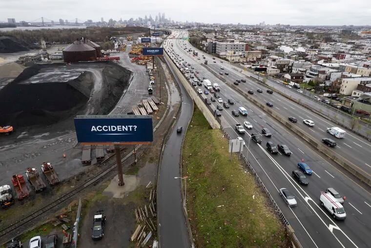 Traffic backs up on I-95 North near Alleghany Avenue after a tractor-trailer damaged a railroad bridge in Philadelphia, Pa.  PennDot said I-95 in Northeast Philly at Exit 26 near the Betsy Ross Bridge will be closed several days for repairs.