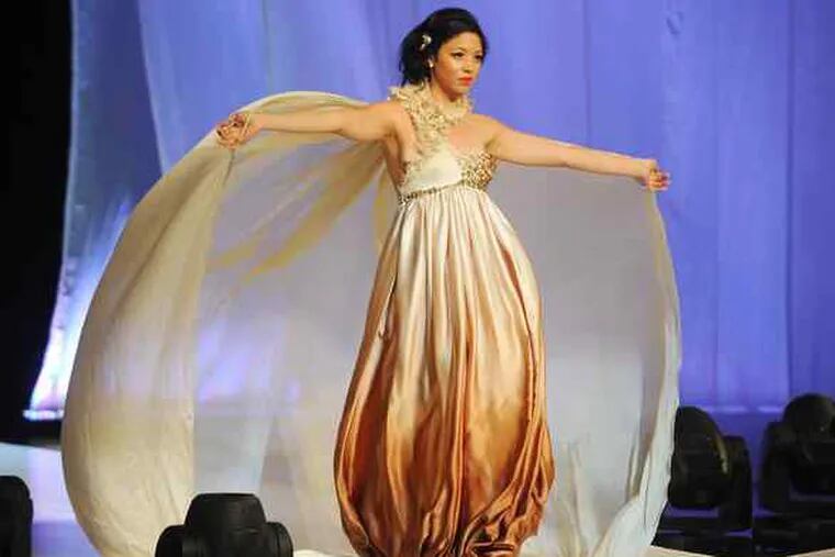 Philadelphia University Fashion Show: A dramatic creation from Rachel Wendling, who won the Best Senior Collection and Frank Agostino Excellence in Eveningwear Award.