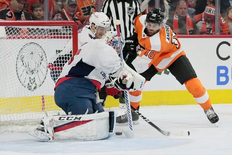 Flyers # 10 Andy Andreoff tries to get the puck past Caps goalie #70 Braden Holtby in the first period of the Washington Capitals at the Philadelphia Flyers NHL hockey game at the Wells Fargo Center in Phila., Pa, on November 13, 2019.