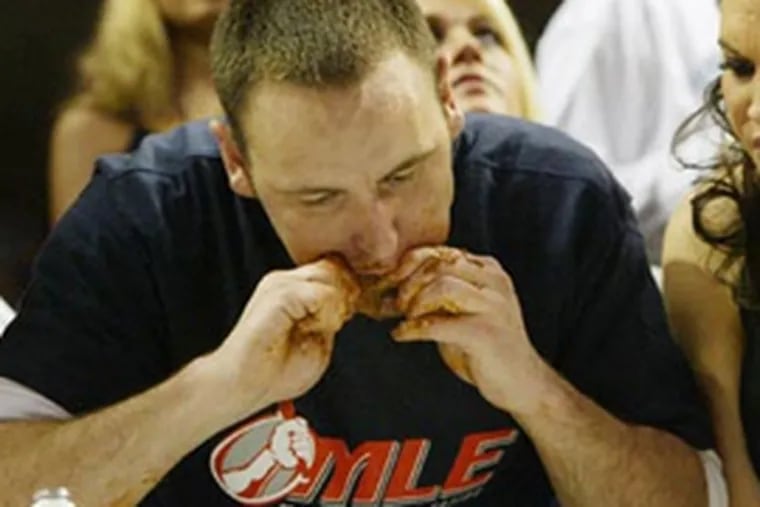 Joey Chestnut chomps his way to victory.