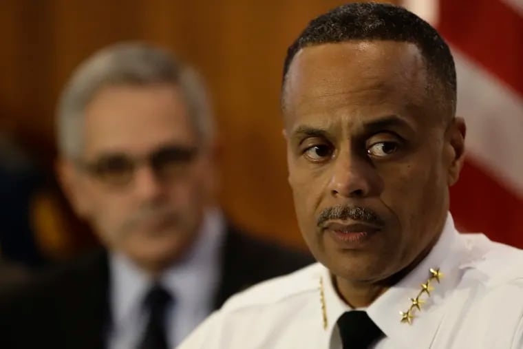 Philadelphia Police Commissioner Richard Ross, right, speaks during a news conference as District Attorney Larry Krasner looks on in November.