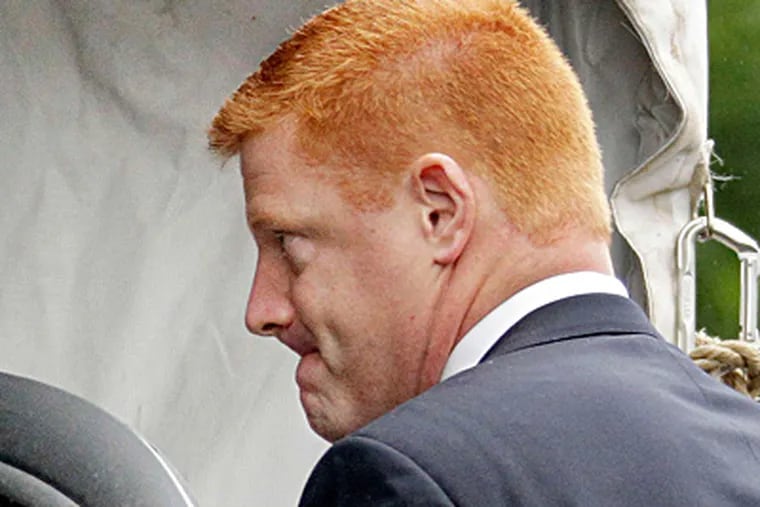 Michael McQueary, Penn State assistant football coach now on leave, arriving at court to testify in the child sex abuse trial of former assistant coach Jerry Sandusky. McQueary said he saw Sandusky sodomizing a boy. GENE J. PUSKAR / Associated Press