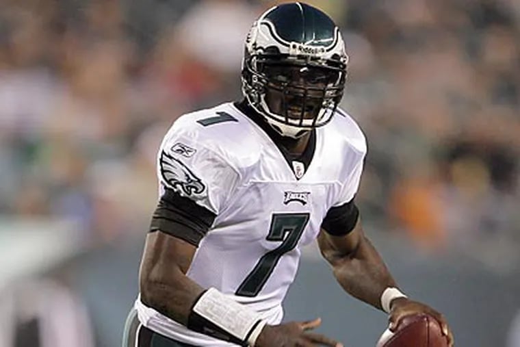 Michael Vick could be the Eagles' answer in short-yardage situations. (Yong Kim/Staff Photographer)