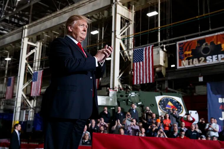 President Donald Trump arrives to deliver remarks at the Lima Army Tank Plant, Wednesday, March 20, 2019, in Lima, Ohio. (AP Photo/Evan Vucci)