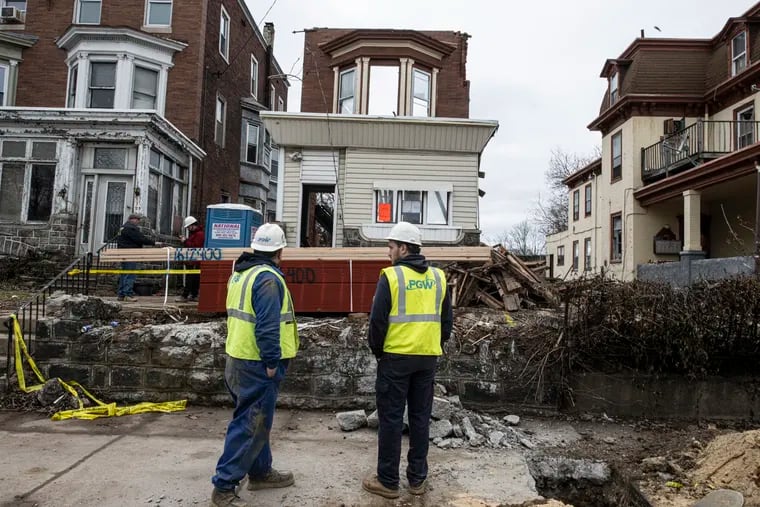 A home collapsed near 63rd and Vine Streets in Philadelphia on Friday.