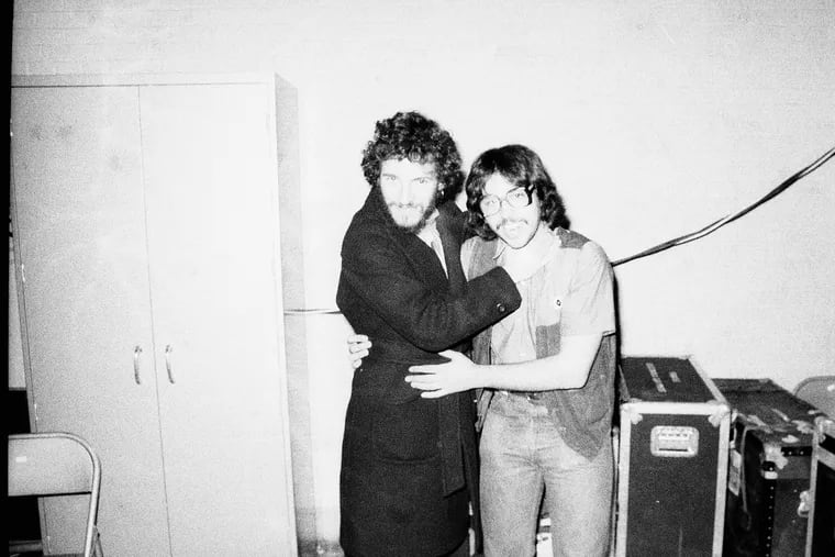 Bruce Springsteen (left) and photographer Phil Ceccola (right) back in the early days.