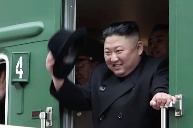 In this image from video released by Primorsky Regional Administration Press Service, North Korean leader Kim Jong Un waves from his train as he leaves Khasan train station in Primorye region, Russia, Wednesday, April 24, 2019. Kim arrived in Russia by train on Wednesday, a day before his much-anticipated summit with Russian President Vladimir Putin that comes amid deadlocked diplomacy on his nuclear program. (Primorsky Regional Administration Press Service via AP)