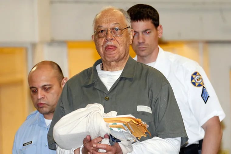 Dr. Kermit Gosnell gets escorted to a van leaving the Criminal Justice Center after being convicted on three counts of first degree murder. (Yong Kim / Staff Photographer, file)