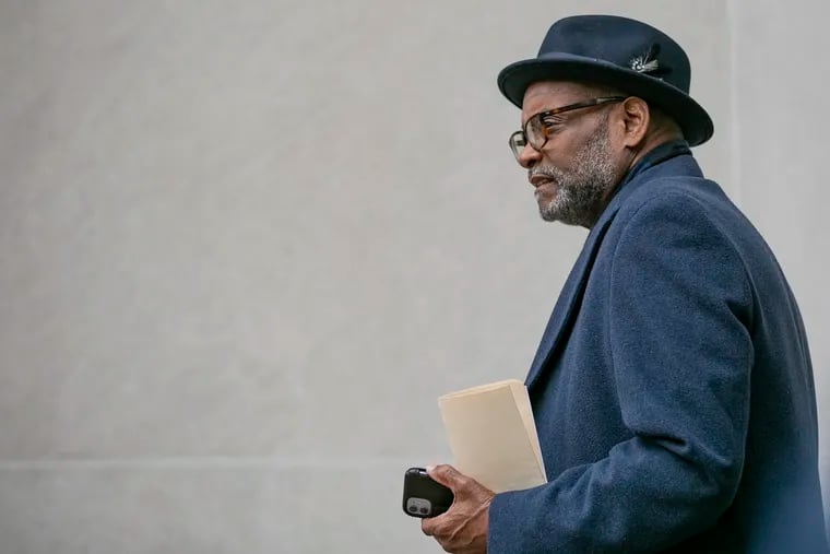 Rahim Islam, the former CEO of Universal Companies, exits the federal courthouse in Center City in January 2020.