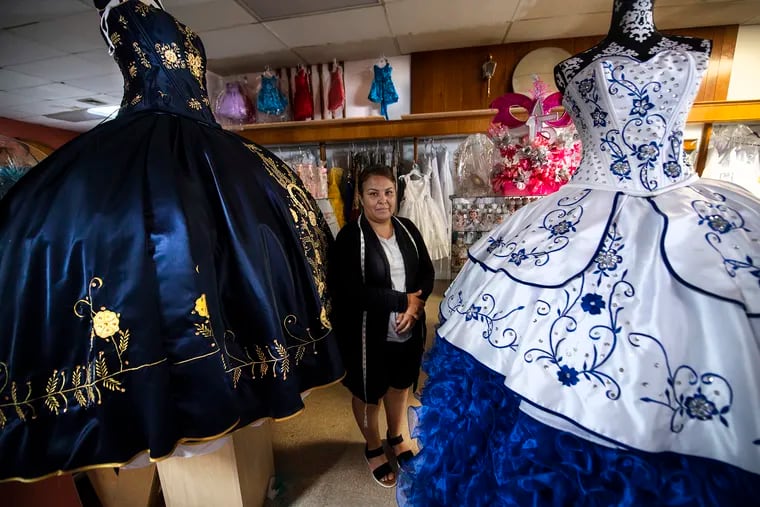 Maryana Cuevas,  in her store, El Guanjuatense, in Bridgeton, N.J. City boosters say new merchants, many of them immigrants from Mexico, are breathing new life into the city's downtown.