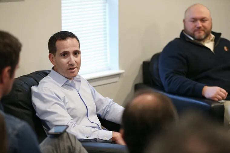 Eagles executive vice president of football operations Howie Roseman, left, and vice president of player personnel Joe Douglas talk to reporters at the NovaCare Complex in South Philadelphia on Thursday.