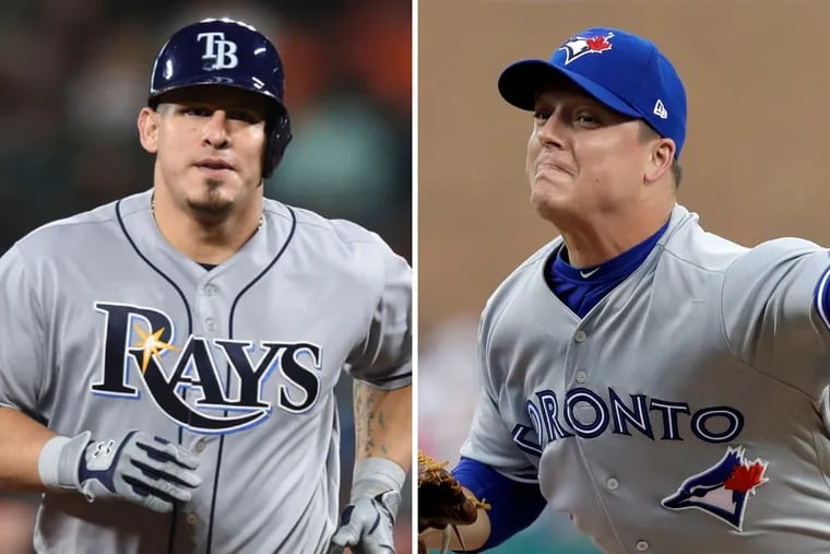 The Phillies added Wilson Ramos (left) from the Rays and Aaron Loup from the Blue Jays at the cusp of the trade deadline.