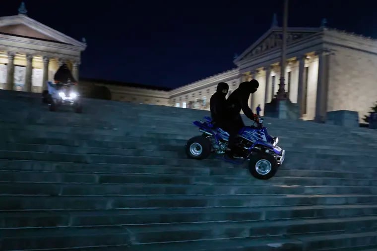 People riding dirt bikes and four wheelers ride down the Art Museum steps in Philadelphia on Saturday, Feb. 3, 2024.