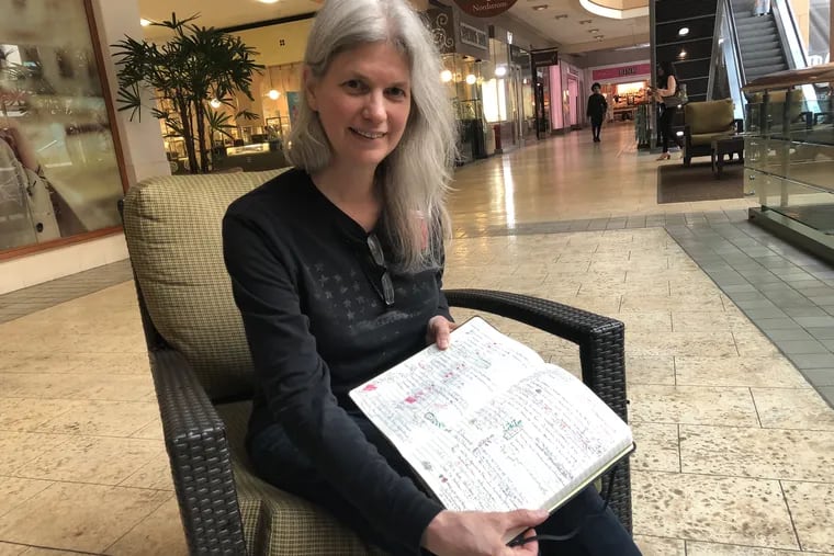 Macy's worker Susan Hedman keeps a notebook of all her schedule changes so she can hold Macy's accountable to Seattle's secure scheduling law.