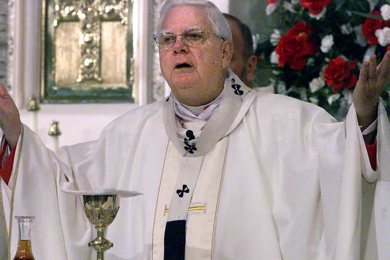 Cardinal Bernard Law celebrates a midday Mass at the Basilica of Our Lady of Perpetual Help church in Boston Friday, May 10, 2002.  Cardinal Law attended Mass after giving a deposition in the church abuse sex scandal involving former priest John Geoghan. During the Mass, Law recited a special prayer for victims of sexual abuse. (AP Photo/Jim Bourg, Pool)