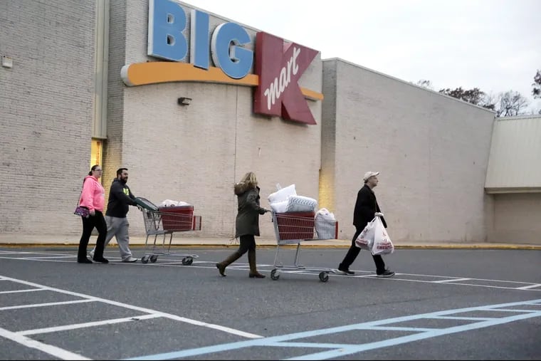 Shoppers leave the Kmart in Glassboro in November, 2016.