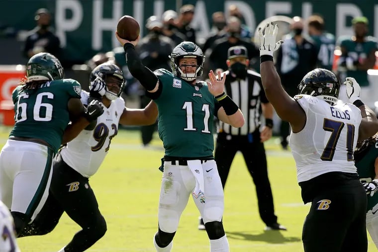 Eagles quarterback Carson Wentz throwing in the second quarter against the Ravens on Sunday.