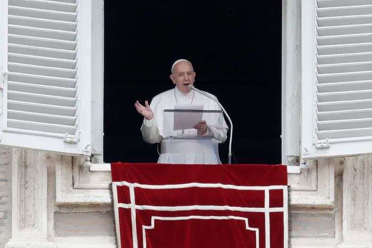 Pope Francis delivers his speech during the Regina Coeli noon prayer from the window of his studio overlooking St. Peter's Square, at the Vatican, Sunday, April 28, 2019. (AP Photo/Alessandra Tarantino)