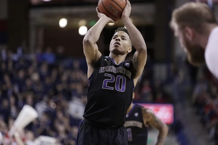 Washington guard Markelle Fultz (20) shoots a free throw during the second half of an NCAA college basketball game against Gonzaga in Spokane, Wash., Wednesday, Dec. 7, 2016.