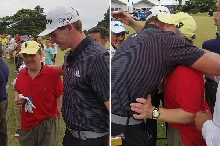 Brandon Matthews (with white cap) meets and hugs the man with Down syndrome who made a noise while he was attempting a key putt in the Argentina Open.
