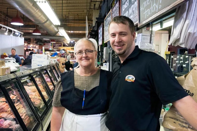 Owner Sam Riehl and his mother, Anna Riehl, at L. Halteman Family Country Foods in Reading Terminal Market. "We feel the Internet is really important to grow a business," Sam Riehl said.