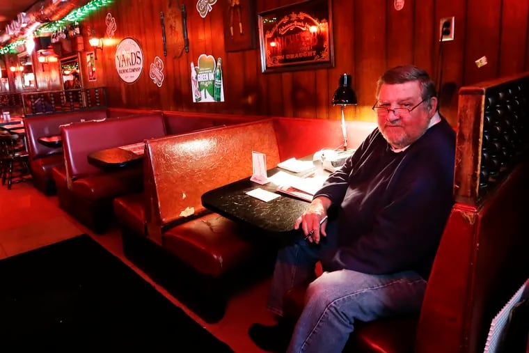 Oscar's Tavern manager Joe Mullan at his back table "office" at Oscar's Tavern on Sansom Street in 2018.