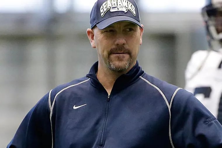 The Eagles will fly Seahawks defensive coordinator Gus Bradley to Philadelphia for a second interview on Tuesday.(Ted S. Warren/AP file photo)