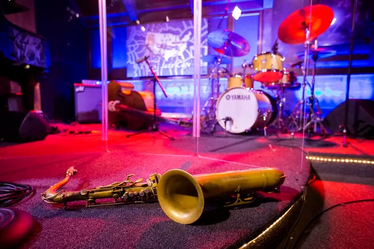A saxophone waits to be played on stage at Chris' Jazz Cafe, the city's longest continually running jazz club.