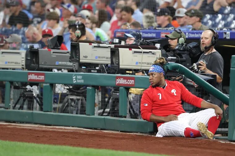 Maikel Franco of the Phillies sits bythe television cameras in the 1st inning during their game against the Braves at Citizens Bank Park on Sept. 11, 2019.