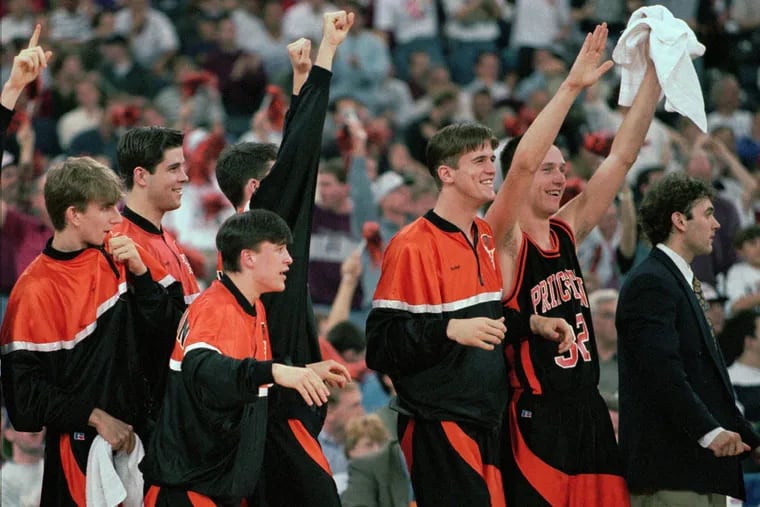 Players on the Princeton bench celebrated as Princeton took the lead from UCLA late in the second half during the first round of the NCAA Southeast Regional in Indianapolis on Thursday, March 14, 1996. Princeton upset UCLA, 43-41.