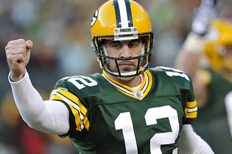 Aaron Rodgers and the Packers could meet the Eagles in the first round of the playoffs. (AP Photo/Jim Prisching)