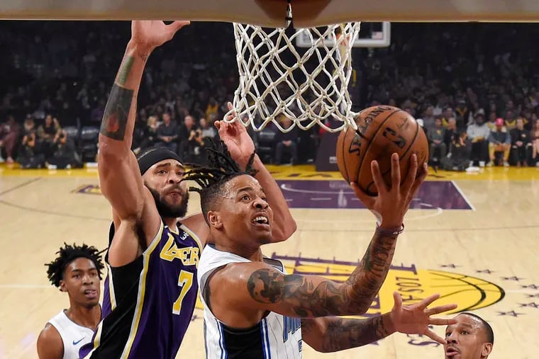 Orlando Magic guard Markelle Fultz, right, posted a triple-double against the Lakers.