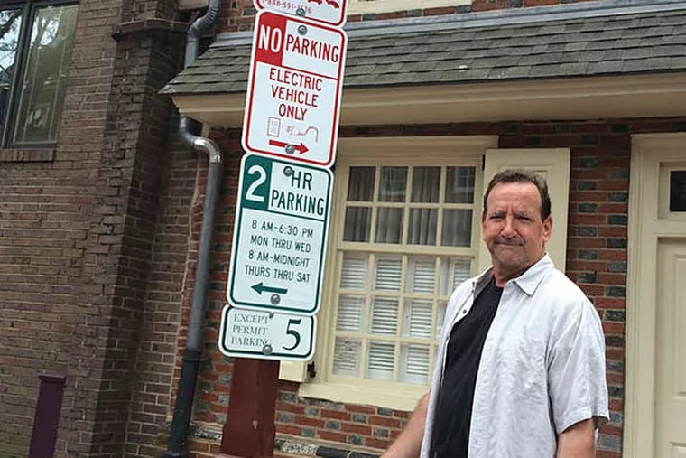 An empty parking space usually stays that way because the house it's in front of is unoccupied. Bob Curley takes issue with that, and with signs being posted on streetlamps.