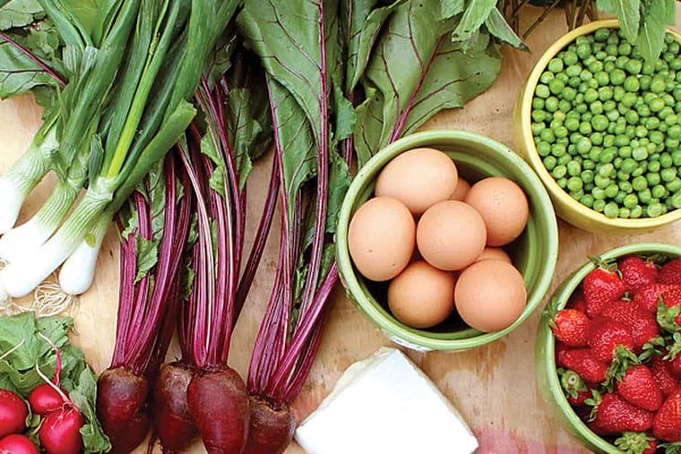 An early-season CSA share from Greensgrow Farms includes peas, strawberries, lettuce, radishes, scallions, beets, eggs, cheese - and more. (Photo: BRYN ASHBURN)