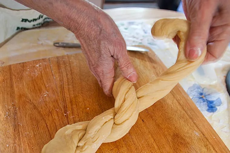 Aunt Roma Lerro braids dough she and chef Joey Baldino made for sweet Easter bread.
