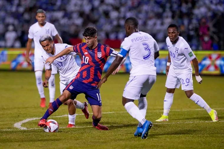Christian Pulisic (10) on the ball during the U.S. men's soccer team's World Cup qualifier at Honduras on Sept. 8, the last time he played for the national team.