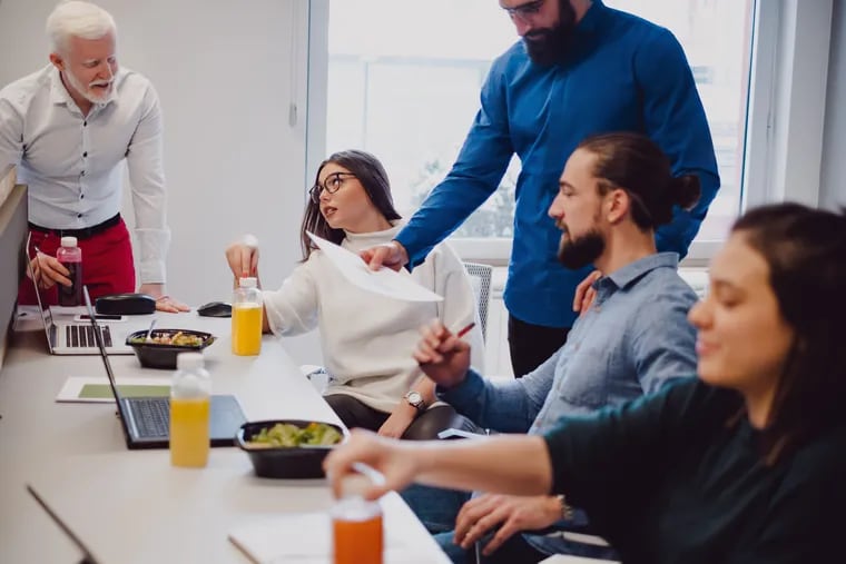 Stock art of employees interacting in a typical office. Given the shortage of workers, are non-compete agreements a good idea, especially for small businesses?
