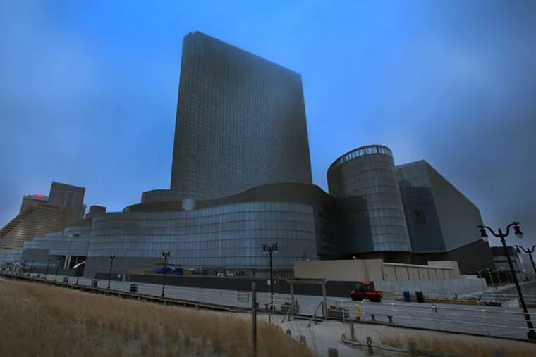Tall, dark and empty: The Revel Casino Hotel after ACR Energy turned off its power Thursday. ACR lacks a deal with new owner Glenn Straub. (MIKE MANGER / For the Inquirer)
