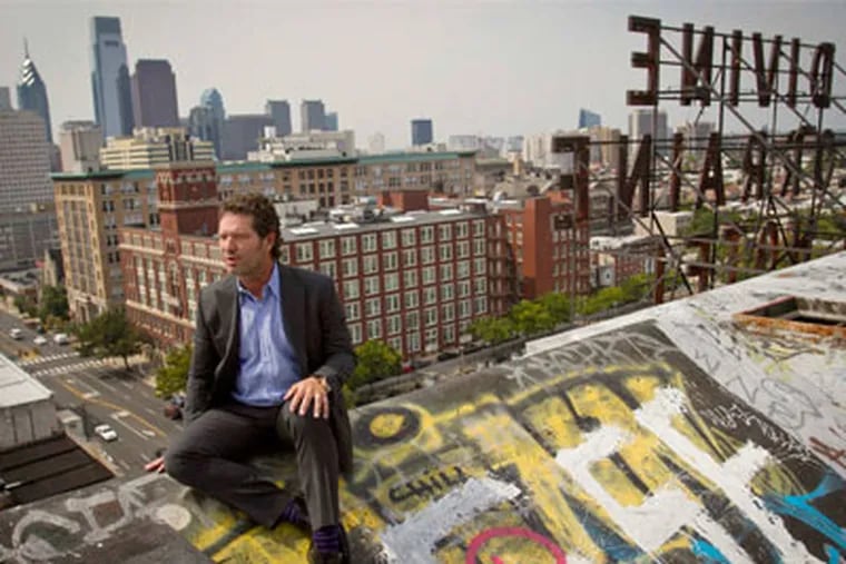 Developer Eric Blumenfeld, who is trying to seal a $44 million deal to convert the Divine Lorraine Hotel at North Broad Street into apartments and ground-floor restaurants, takes in the view from 11 stories up. MICHAEL S. WIRTZ / Staff Photographer