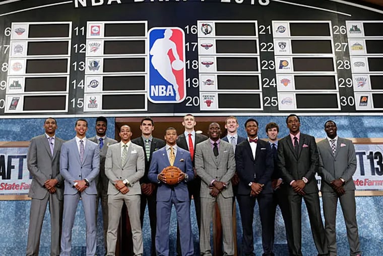 Members of the 2013 NBA basketball draft class pose together before the first round of the draft, Thursday, June 27, 2013, in New York. (Kathy Willens/AP file)