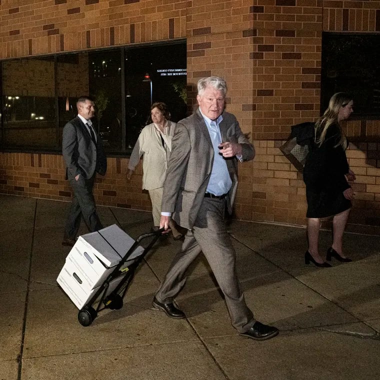 Former labor leader John Dougherty and his nephew, Greg Fiocca (left), leave the federal courthouse in Reading on Thursday after a judge declared a mistrial in their extortion case.