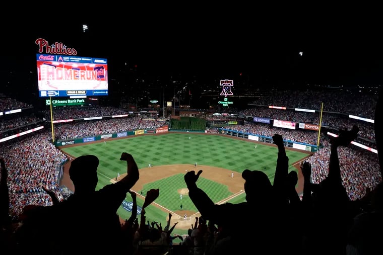 Fans react to a home run by Nick Castellanos during Game 4 of the National League Division Series Thursday at Citizens Bank Park. The Phillies beat the Atlanta Braves, 3-1, and now face the Arizona Diamondbacks in their quest to return to the World Series.