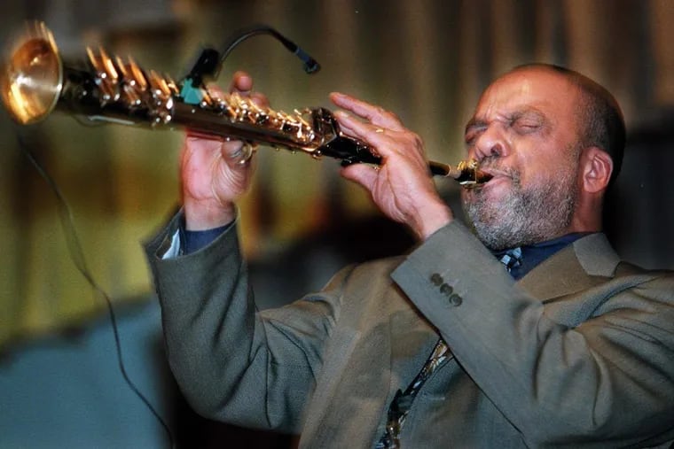 Jazz artist Grover Washington Jr. playing for students in 1998. Washington died a year later.