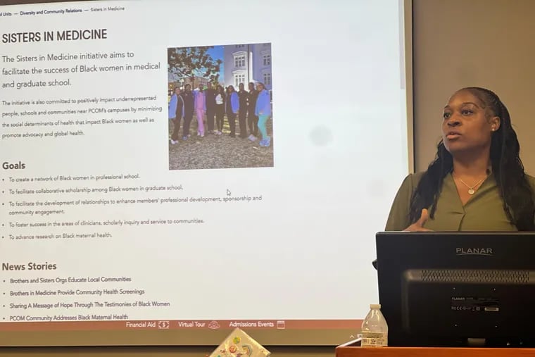Ashley Poole, faculty advisor for the Philadelphia chapter of Sisters in Medicine at the Philadelphia College of Osteopathic Medicine, presenting at the group's launch on Wednesday, Sept. 6, 2023.