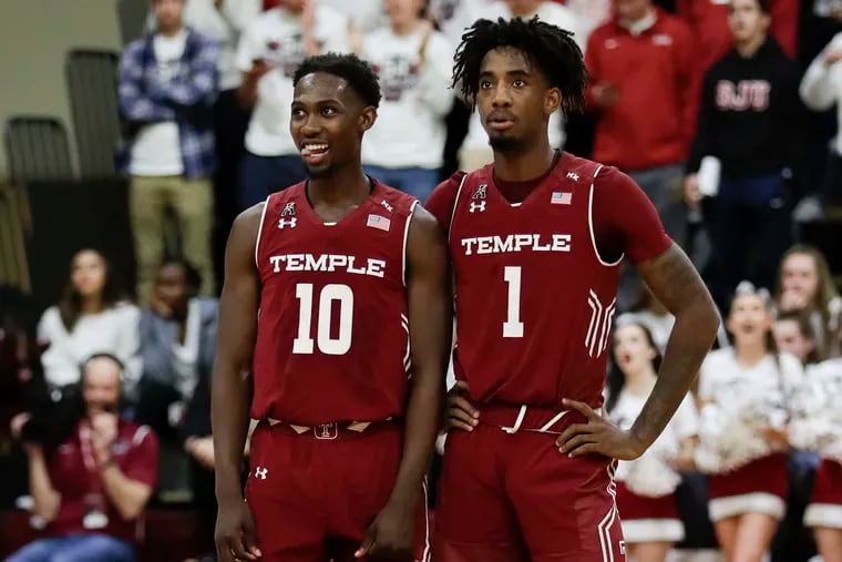 Temple guards Shizz Alston Jr., (left) and Quinton Rose during the game against St. Joe's.