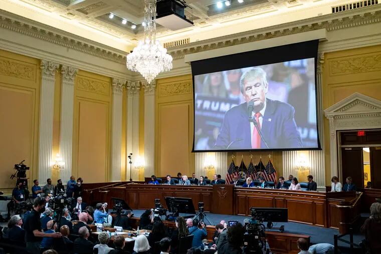 An image of former President Donald Trump was displayed as the House select committee investigating the Jan. 6 attack on the U.S. Capitol continued to reveal its findings of a year-long investigation, at the Capitol in Washington on Tuesday.