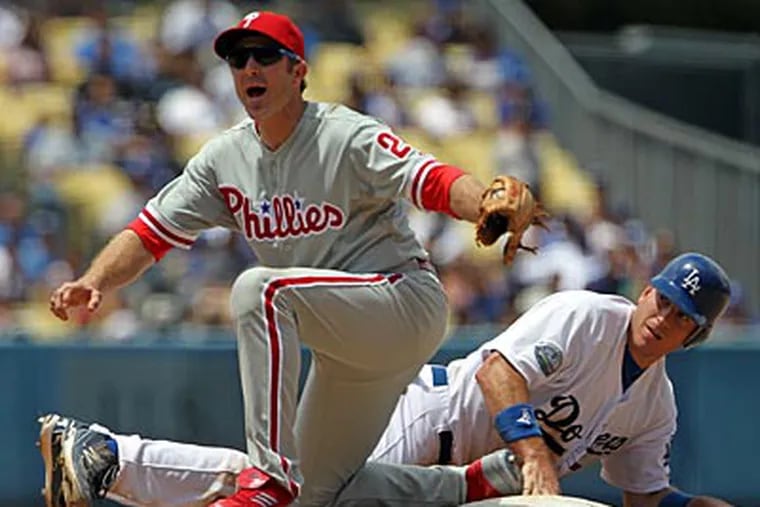 The Phillies failed to complete a three-game sweep of the Dodgers in Los Angeles. (Reed Saxon/AP)