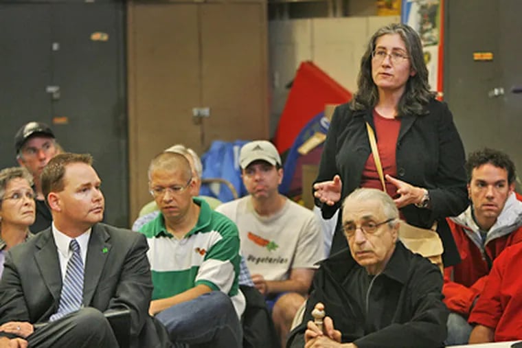 Residents and merchants from the South Street community gathered at the Palumbo Recreation Center yesterday to discuss with police the recent youth invasion, which caused injuries and property damage. The kids organized via online social media. (Alejandro A. Alvarez / Staff photographer)